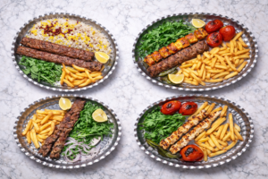 Mixed Iranian food platter with kebabs and rice at Najmat Kabab, best Persian restaurant in Dubai